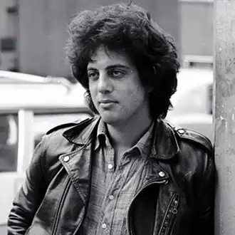 Billy Joel wearing leather jacket in New York city 1973